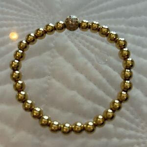 Gold beaded bracelet- never worn.